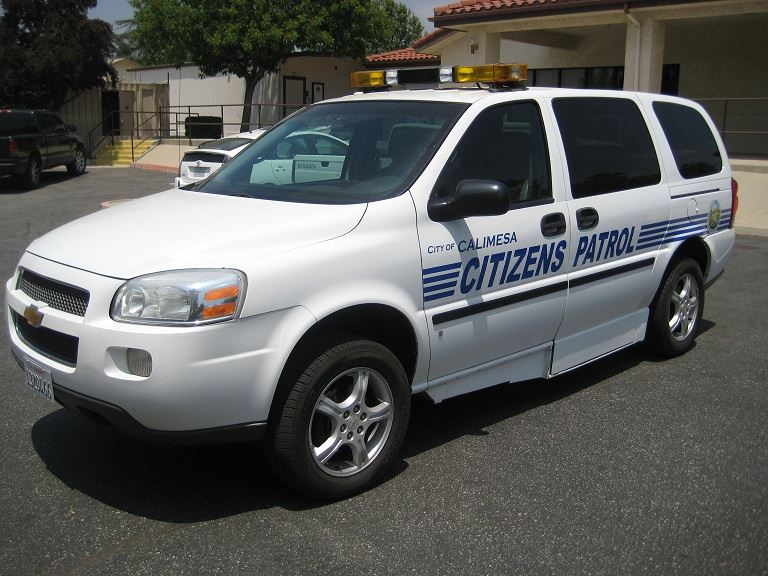 A parked Citizens on Patrol van